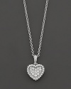 A lovely pendant with pave-set diamonds in 14 Kt. white gold.