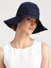 Cotton cloche, with wide stitched brim and pleated trim, retains its shape after packing.CottonLogo button detailPleated bandBrim, about 4Spot cleanMade in Italy