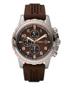 Sport style never looked so handsome. Dean collection watch by Fossil crafted of brown perforated silicone strap and round stainless steel case with rose-gold plating at bezel. Brown chronograph dial features applied rose-gold numerals, white minute track, date window at three o'clock, three subdials, three hands and logo. Quartz movement. Water resistant to 50 meters. Eleven-year limited warranty.