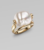 The creamy luster and organic shape of a baroque pearl is the centerpiece of a ring of polished 18k gold vermeil. 16mm baroque white organic man-made pearl 18k gold vermeil Made in Spain