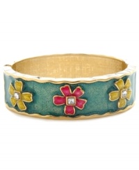 Give her flowers that will never die. Betsey Johnson's chic slip-on bangle features a glittery blue surface decorated with pink and yellow crystal-accented flowers. Set in gold-plated mixed metal. Approximate diameter: 4 inches.