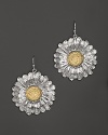 Blooming daises are detailed in 18K yellow gold accents on these Buccellati earrings.