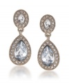 Double exposure: You'll look twice as nice--not to mention elegant!--in Carolee's pave stone double drop earrings. Showcasing sparkling glass stones, they're made in gold tone mixed metal. Approximate drop: 1-5/8 inches.