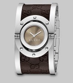 From the Twirl Collection. A modern design featuring a sun-brushed color dial and a stainless steel cuff with brown leather Guccissima inset. Swiss quartz movementWater resistant case to 3 ATMRound stainless steel case, 23mm (0.9)Riveted bezelBrown sun-brushed color dialStainless steel cuff with brown Guccissima leather insetMade in Switzerland 