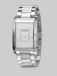 A sleek design with a mastery of the everyday in stainless steel with a curved bracelet. Rectangle bezel Quartz movement Water resistant to 5 ATM Second hand Stainless steel case: 31mm (1.22) Stainless steel bracelet: 23mm (0.90) Deployment clasp Imported 