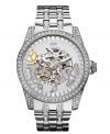 Cast a spell with the crystal shimmer on this sleek automatic watch from GUESS.