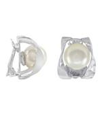 A timeless tradition for style excellence. Majorica earrings feature white, organic, man-made pearls (10 mm) set in a swirling, sterling silver clip on setting. Approximate drop: 1 inch.