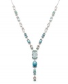 Stir up a style sensation in a fresh splash of blue. Y-shaped necklace by Swarovski features sparkling light blue crystals set in palladium plated mixed metal. Approximate length: 19 inches.