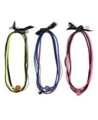 Simply charming. These lovely little accessories from Juicy Couture will dress your tresses in an assortment of signature charms, beads and unexpected ornaments. Presented in packs of three in a kaleidoscope of colors.