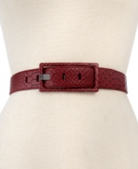 Opt for exotic accessorizing with this snakeskin-embossed leather belt from Calvin Klein. Accented with subtle, signature centerbar and chic square buckle, it's the perfect way to accentuate any outfit.