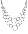 Add a captivating look to your attire with this circle link necklace from Sequin. Crafted in silver tone mixed metal. Approximate length: 15 inches + 3-inch extender. Approximate drop: 3 inches.