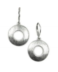 Make a stellar statement in lunar circles. Earrings by Jones New York feature chic, cut-out circles. Setting and leverback crafted in silver tone mixed metal. Approximate drop: 1-3/8 inches.