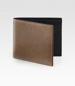 Inspired by the standard geometric graph paper, this leather credit card holder finds the balance between practicality and style.One billfold compartmentSix card slotsLeather4W x 4HImported