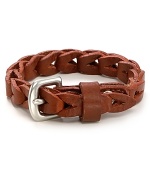 This braided leather bracelet is offset by a gold metal buckle for a classic masculine look.