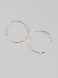 Slender hammered hoops of sterling silver and 18k gold, finished in the warm glow of 18k rose goldplating. An alloy of 18K gold and sterling silver plated with 18K rose gold Diameter, about 1¾ Post back Imported