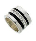 Add extra punch to your look in bold style that sparkles. GUESS ring features a simple band decorated with a row of round-cut crystals and two black enamel stripes. Set in silver tone mixed metal. Size 7.