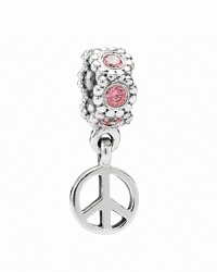 A sterling silver peace sign dangles from a PANDORA charm sparkling with salmon cubic zirconia.