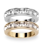 A dynamic--and dazzling!--duo: Swarovski's band rings sparkle plenty with bezel-set, square-cut clear crystals. Set in silver tone and gold tone mixed metal, they'll look stylish whether worn separately or together. Size 7.