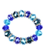 Drink in the cool blues! Captivating with tonal blue plastic beads, Nine West's stretch bracelet also boasts silver tone rondelles with clear crystal accents. Bracelet stretches to fit wrist. Crafted in imitation rhodium-plated mixed metal. Approximate diameter: 2 inches.