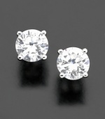 Beautiful round-cut cubic zirconia  (1 ct. t.w.) is the perfect accent to any outfit.  Earrings set in sterling silver and finished in platinum, by CRISLU.