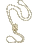 A must-have for every wardrobe from the island of Mallorca, Spain. This classic endless rope necklace features white round organic man-made pearls (8 mm) and can be worn a multitude of ways to enhance any outfit. Approximate length: 60 inches.