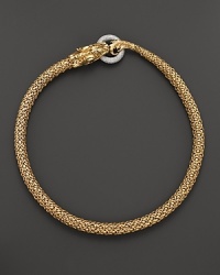 An 18K yellow gold dragon clasps a diamond pavé link in this striking necklace from John Hardy.