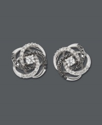 Take love to the next level in symbolic knot studs. Wrapped in Love™ design provides sparkle and contrast with luminous round-cut white diamonds (1/3 ct. t.w.) and black diamonds (1/5 ct. t.w.) set in 14k white gold. Approximate diameter: 1/2 inch.