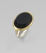 From the Saddle Collection. Sleek and dramatic, a beveled oval of matte black onyx is simply set in a frame of goldplated sterling silver, atop a bold sterling silver band.Black onyxSterling silver and goldplated sterling silverWidth, about ¾Imported