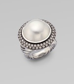 From the Moonlight Ice Collection. A stunning mabe pearl sits center of two rows of sparkling diamonds in blackened sterling silver. White mabe pearlDiamonds, 1.36 tcwBlackened sterling silverWidth, about ½Imported