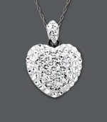 Step it up in the romance department. You'll adore Kaleidoscope's glamorous heart pendant that shines in clear crystals made with Swarovski Elements. Setting and chain crafted in sterling silver. Approximate length: 18 inches. Approximate drop: 7/10 inch.