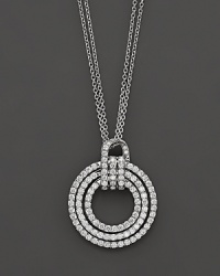 Diamond circle pendant in white gold with link chain.