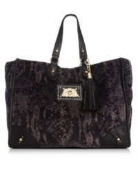 Give your look an exotic edge with this sleek snakeskin-print tote from Juicy Couture. Soft velour is outfitted with luxe golden hardware and signature detailing, making it the ultimate diva-worthy design.