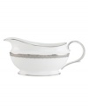 Inspired by the trim on an elegant gown, the graceful Lace Couture gravy boat features an intricate platinum border that combines harmoniously with white bone china for unparalleled style. From Lenox.