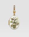 Pearl-look CRYSTALLIZED - Swarovski Elements sparkle on this handcrafted, hand-enameled birthstone locket that opens to hold a favorite photo. Crystal Enamel 18k goldplated brass & brass-plated pewter Month indicated on the back Length, about 1¼ Width, about 1 Spring clip clasp Made in USA