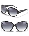 Turn heads in Gucci's oversized round sunglasses with large crystal logo detail at sides.