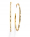 Get dramatic with large statement hoops. Lauren by Ralph Lauren presents hoop earrings with extra flair-coated with sparkling pave-set crystals. Crafted in gold tone mixed metal. Approximate diameter: 1-1/2 inches.