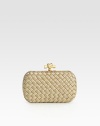 This petite design features goldtone mesh in an elegant woven pattern and an unique knot detailed closure.Top clasp closureSuede lining7¼W X 4¼H X ¾DMade in Italy