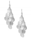 Shimmering circles create an elegant silhouette on these Kenneth Cole New York chandelier earrings. Crafted in silver tone mixed metal. Approximate drop: 2-3/4 inches.