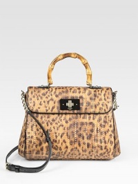 Leopard-printed raffia mixes with bamboo and patent leather accents for an instantly chic flap-top design. Bamboo top handle, 4¼ dropAdjustable detachable patent leather shoulder strap, 18½-21 dropTurnlock flap closureProtective metal feetOne inside zip pocketTwo inside open pocketsFully lined10¼W X 8H X 3DImported