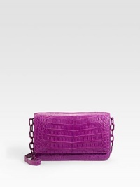 A timelessly chic design in beautiful crocodile, features a removable strap to convert it to a crossbody bag.Removable leather and chain strap, 22½ drop Magnetic flap closure One outside open pocket Two inside zip pockets Two inside open pockets Six credit card slots Leather lining 7½W X 5H X 1½D Imported