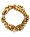 Relive the golden age with this torsade bracelet from Charter Club. Plastic and glass beads form delicate clusters, creating a stylish design. Crafted in gold tone mixed metal. Approximate length: 7-1/2 inches.