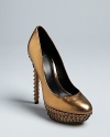 In a word, these B Brian Atwood platform pumps wow: studded soles and heels take liquid metallic uppers over the top.