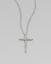 A beautiful cross that sparkles with diamonds in 18k gold on a chain link necklace. Diamonds, .1 tcw18k white goldLength, about 16 to 18 adjustablePendant size, about ½ Lobster clasp closureMade in Italy