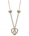 A lovely addition to your jewelry box. This long necklace from Betsey Johnson flaunts a dangling rope heart pendant with a crystal accent at the center. With a silver tone crystal cup chain accent and gold tone rope bows. Crafted in antiqued gold tone mixed metal. Approximate length: 32 inches + 3-inch extender. Approximate drop: 1-1/2 inches.