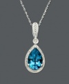 A single teardrop suspended from a delicate chain. Crafted in 14k white gold, this intricate pendant features a pear-cut blue topaz (3 ct. t.w.) and round-cut diamond (1/10 ct. t.w.). Approximate length: 18 inches. Approximate drop: 1 inch.