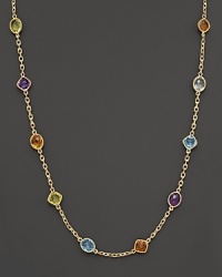 This multi gemstone necklace features colorful stone stations against a stunning 14 Kt. gold setting and chain.