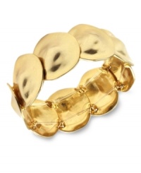 Set your style into circular motion. Bracelet by Jones New York features shiny overlapping discs crafted in gold tone mixed metal. Bracelet stretches to fit wrist. Approximate diameter: 2-1/4 inches.