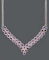 Envelope your neckline in lustrous gemstones. Two rows of vibrant oval-cut amethyst (14 ct. t.w.) are set in polished sterling silver with a double chain design. Approximate length: 11 inches.