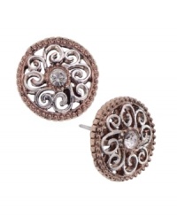 Complete your whole look with a pair of sparkling studs. Perfect for day or night, these 2028 earrings feature a unique, filigree, silver and rose gold tone mixed metal setting with a round-cut crystal center stone. Approximate diameter: 3/4 inch.