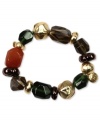 Jones New York blends multi-colored resin beads for an nature-inspired bracelet design. Set in worn gold tone mixed metal. Bracelet stretches to fit wrist. Approximate diameter: 2-1/4 inches.